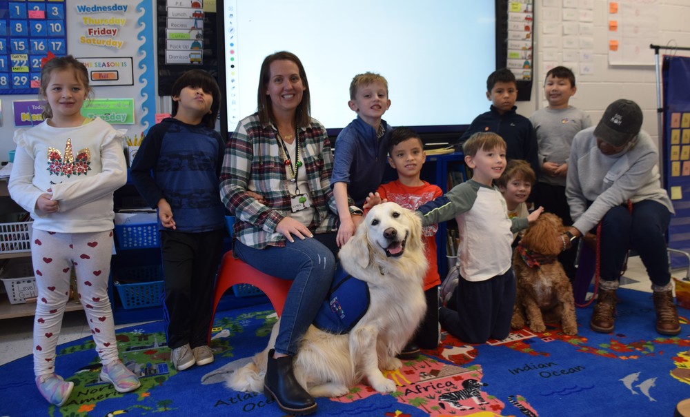 Therapy dogs Holly the Golden Retriever and Lucie the Golden Doodle visited Bayville Primary on Dec. 19.