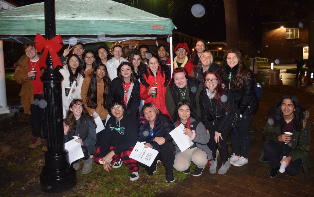 The chamber singers don't let the rain in Locust Valley dampen their spirits.