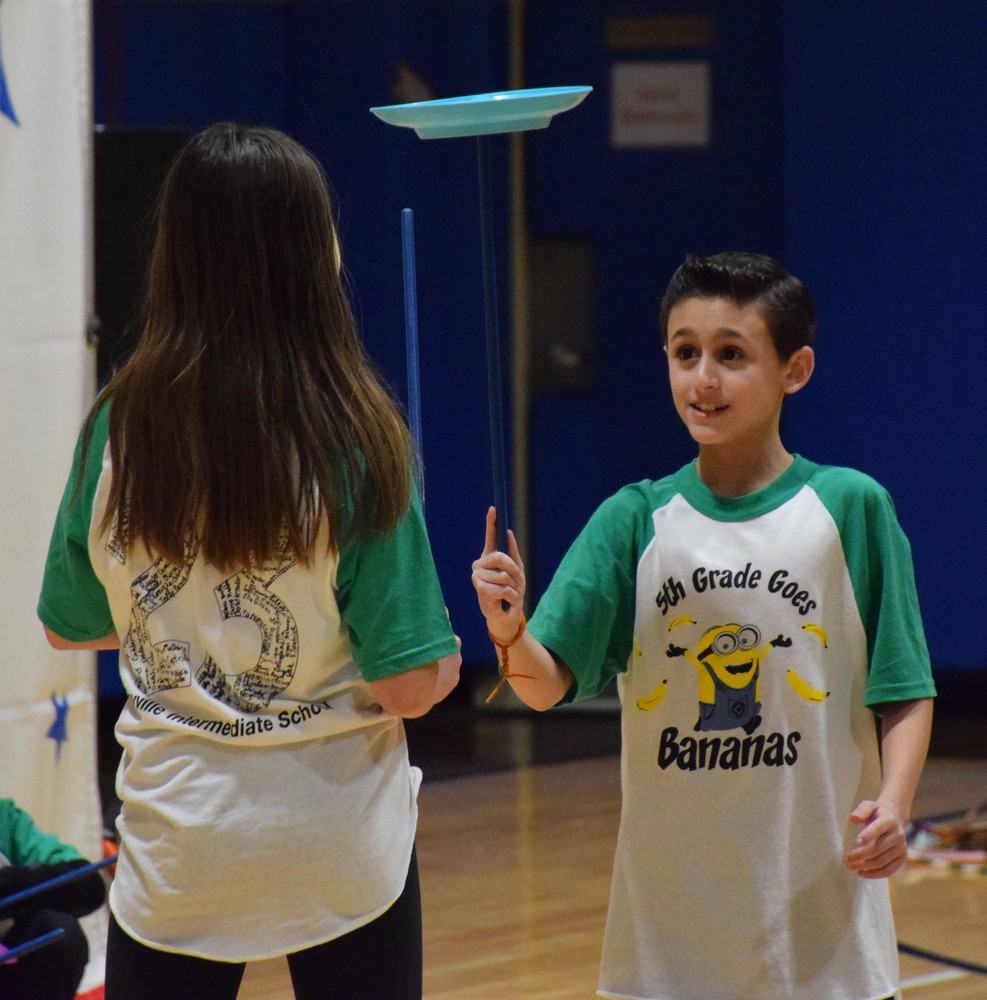 Bayville Intermediate School fifth-grader Vincenzo Consolazio balances a plate during the performance on Feb. 3.