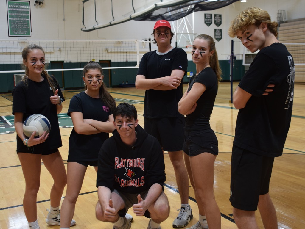 One of the eight volleyball teams prepares for the tournament.
