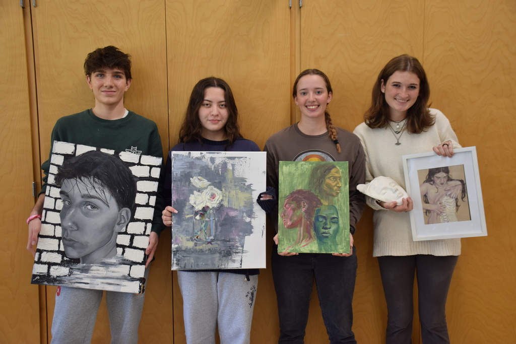 Locust Valley High School students (left to right) William Koch, Sammar Khwaja, Clare Simon and Julianna Nabet with their selected art pieces.