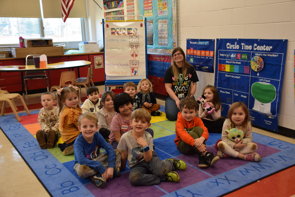 Stephanie Butera’s pre-K class at Ann MacArthur Primary gather for their first story time of the year.
