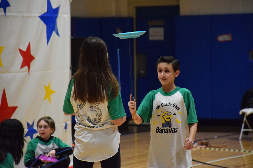 Bayville Intermediate School fifth-grader Vincenzo Consolazio balances a plate during the performance on Feb. 3.