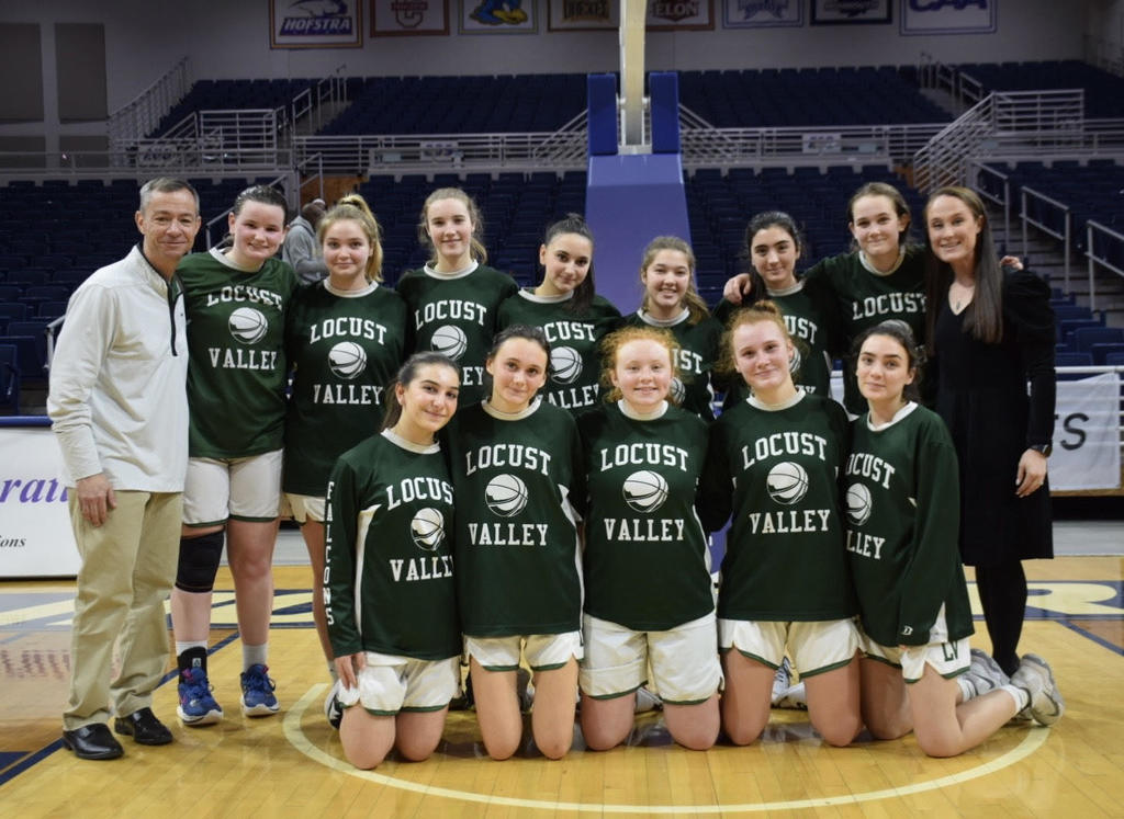 The girls varsity team after their 45-40 comeback win over Seaford in the county semifinals.