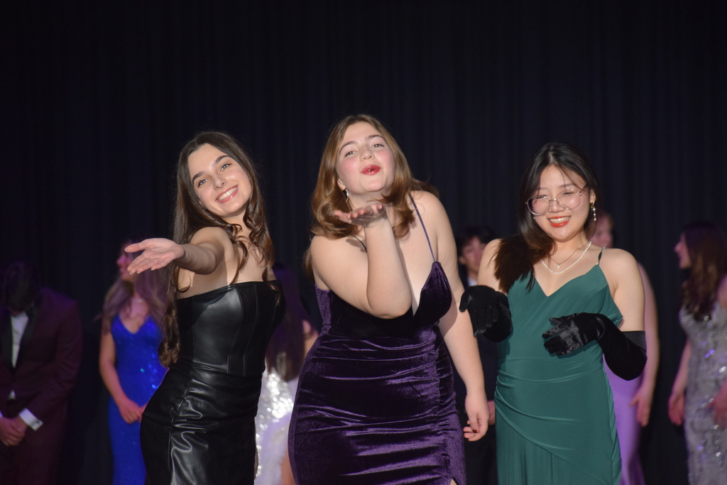 Gianna Spinella, Hope McQuiston and Stephanie Chi donned prom dresses.