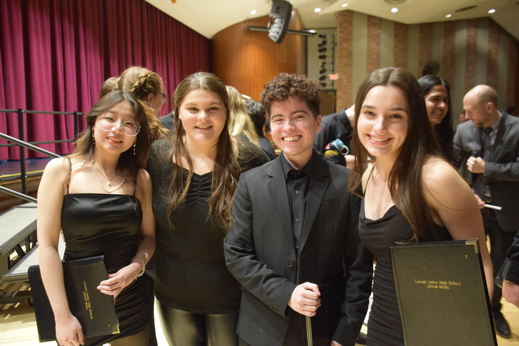 LVHS chamber singers and Hofstra chamber choir share the stage for a collaborative concert.