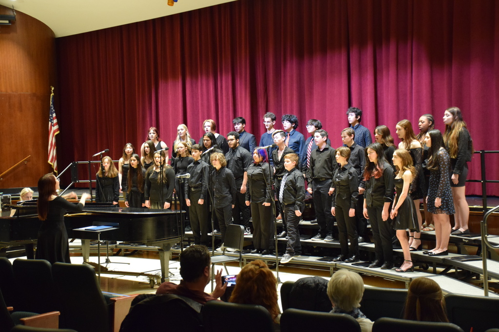 LVHS chamber singers and Hofstra chamber choir share the stage for a collaborative concert.