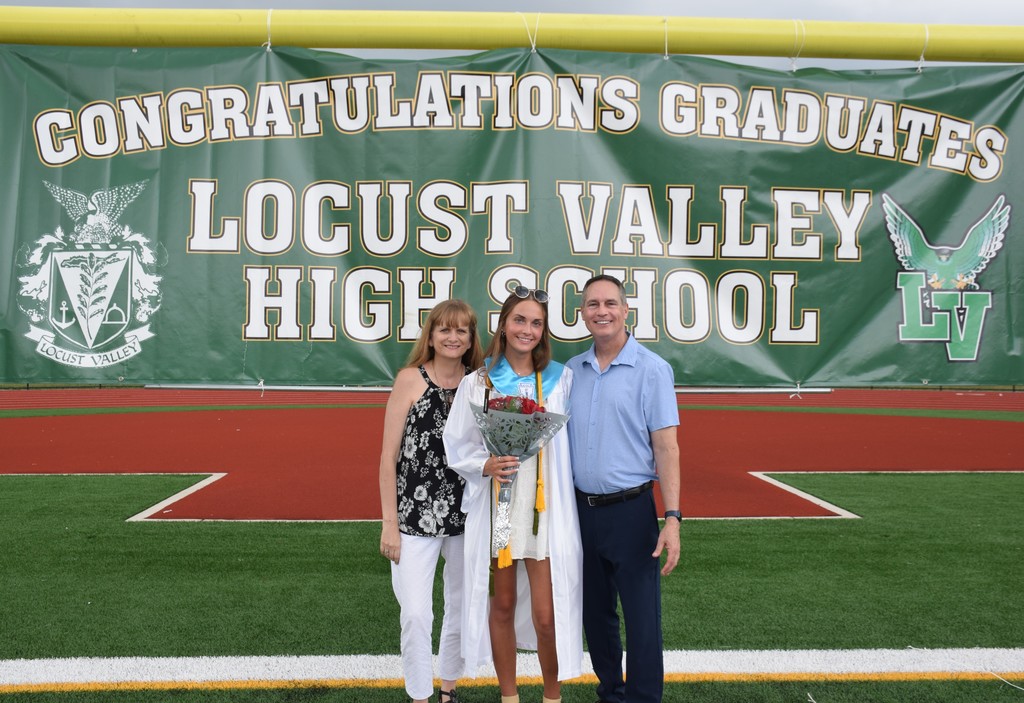 Graduate Tricia Mavros with her family after the graduation ceremony.