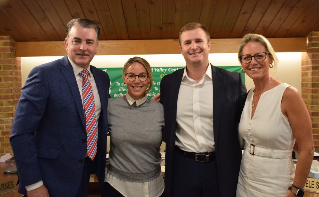 Locust Valley Board of Education members Matthew Barnes, Holly Esteves, Nicholas J. DellaFera and Lauren Themis were sworn in at the district office on July 10.